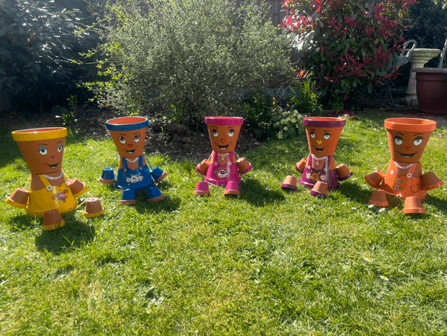 A Garden Sculpture ~ The Pot People