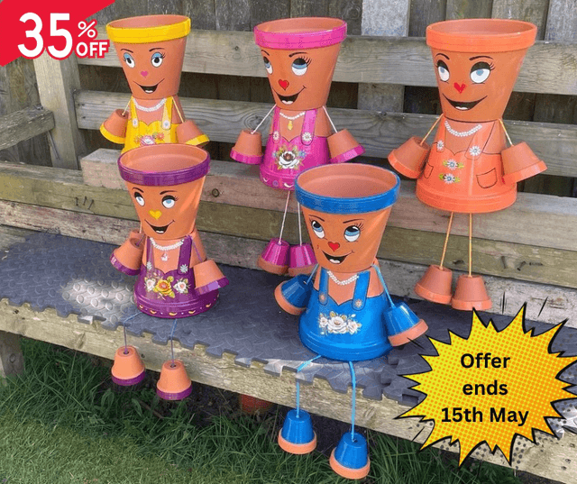A Garden Sculpture ~ The Pot People